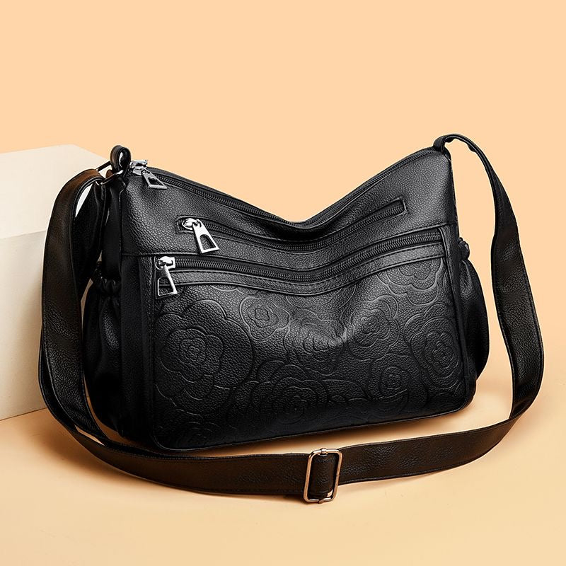 Bolso de piel con estampado de rosas