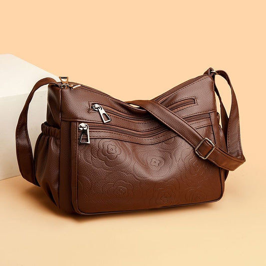 Bolso de piel con estampado de rosas