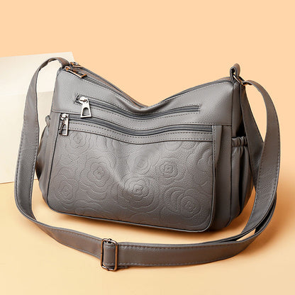 Bolso de piel con estampado de rosas