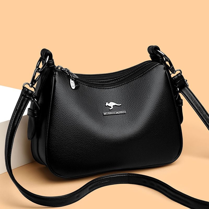 Bolso bandolera clásico de piel suave