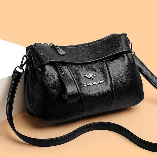 Bolso bandolera de piel suave con logotipo