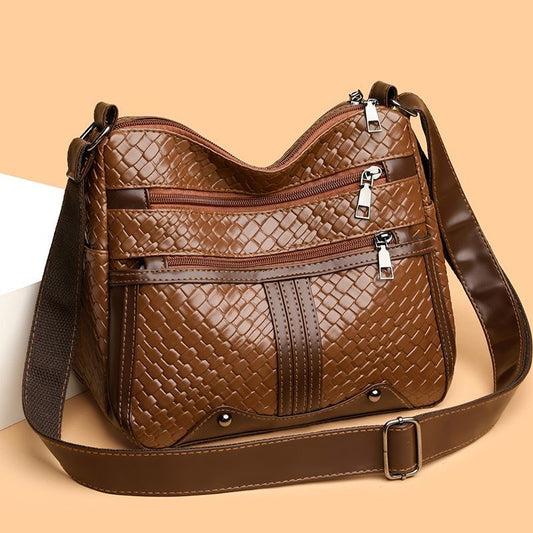 Bolso de piel trenzada suave