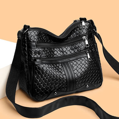 Bolso de piel trenzada suave