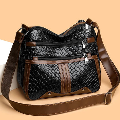 Bolso de piel trenzada suave