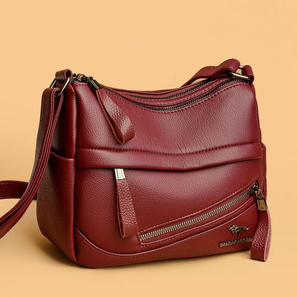 Bolso de piel con cremallera inclinada