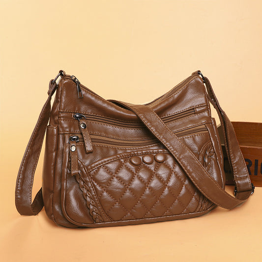 Bolso bandolera multicapa de piel suave