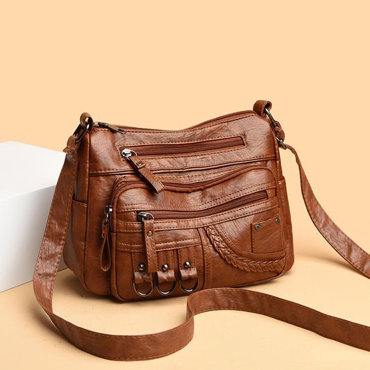 Bolso bandolera de gran capacidad con múltiples bolsillos