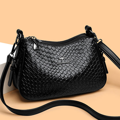 Bolso bandolera tejido de cocodrilo