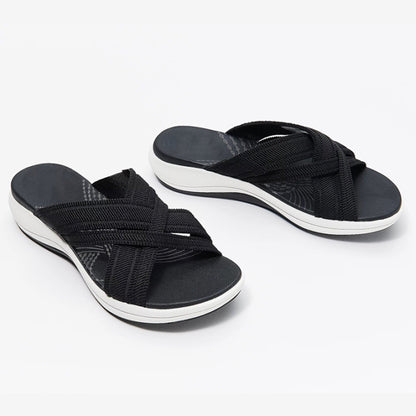 Sandalias cruzadas de punto con mosca