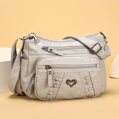Bolso de piel práctico e informal con múltiples bolsillos