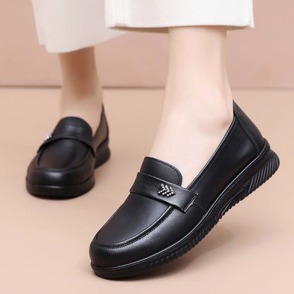 Zapatos cómodos de piel suave con punta redonda