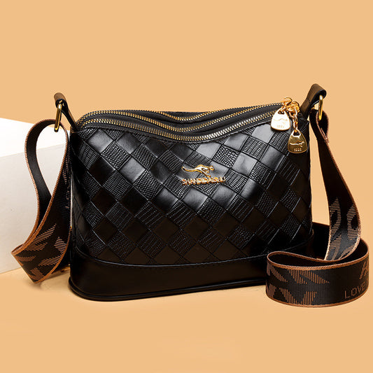 Bolso bandolera de piel suave con estampado de rombos