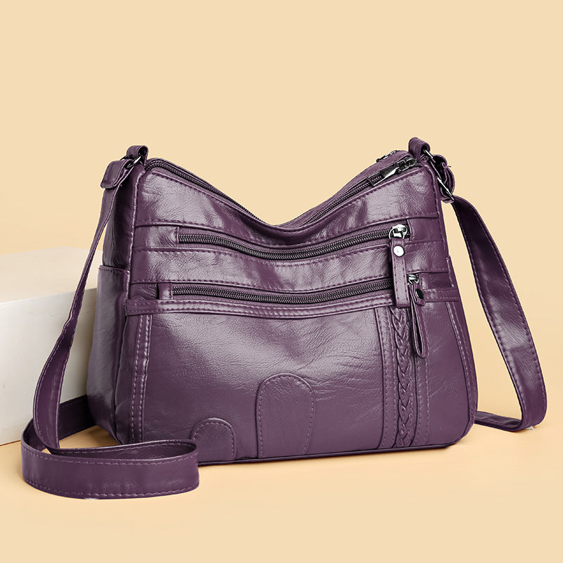 Bolso de piel tejido con forma de nube