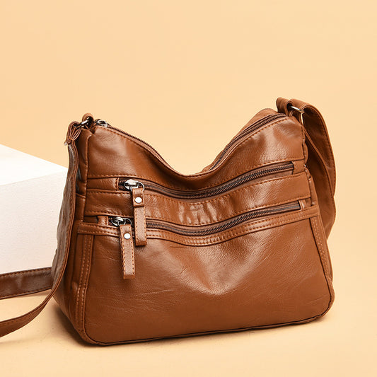 Bolso de piel de color liso