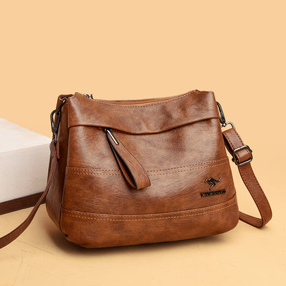 Bolso bandolera de piel suave con cremallera