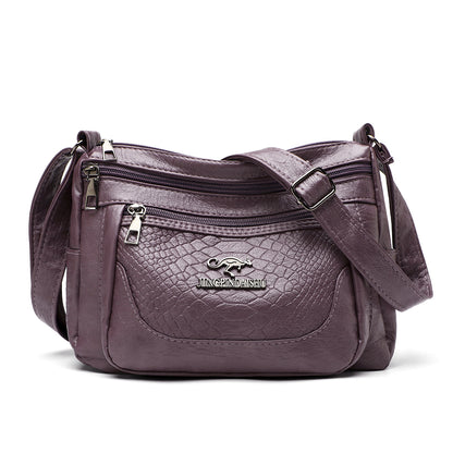 Bolso bandolera de piel suave estampada