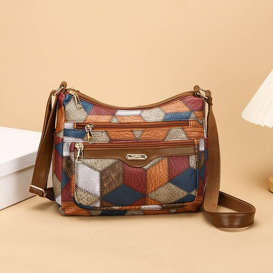 Bolso de piel con bloques de color