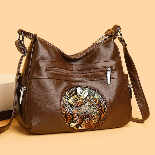 Bolso de piel con estampado de conejo