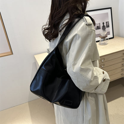 Bolso de mano a juego