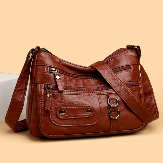 Bolso de piel con doble anilla