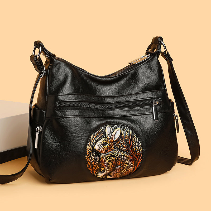 Bolso de piel con estampado de conejo