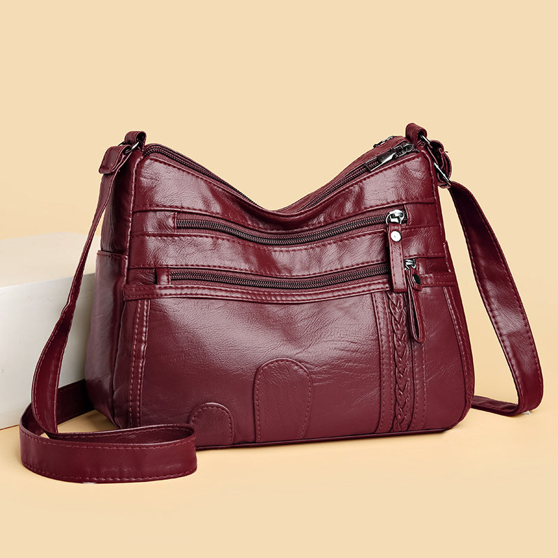 Bolso de piel tejido con forma de nube