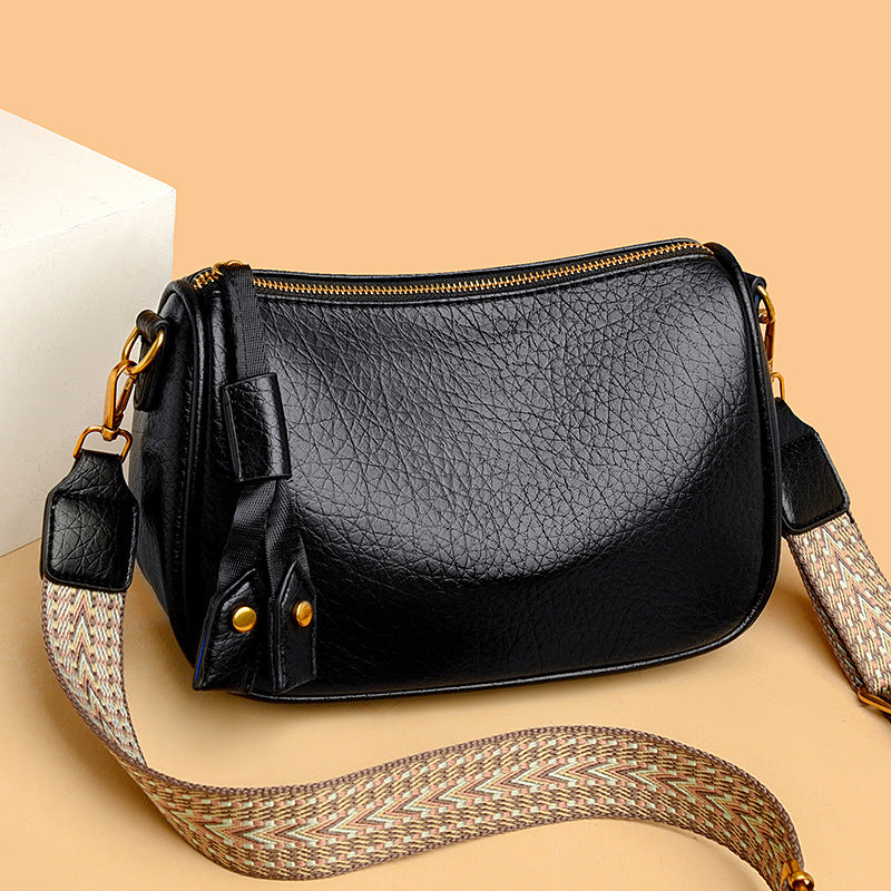 Bolso de piel suave con bandolera ancha