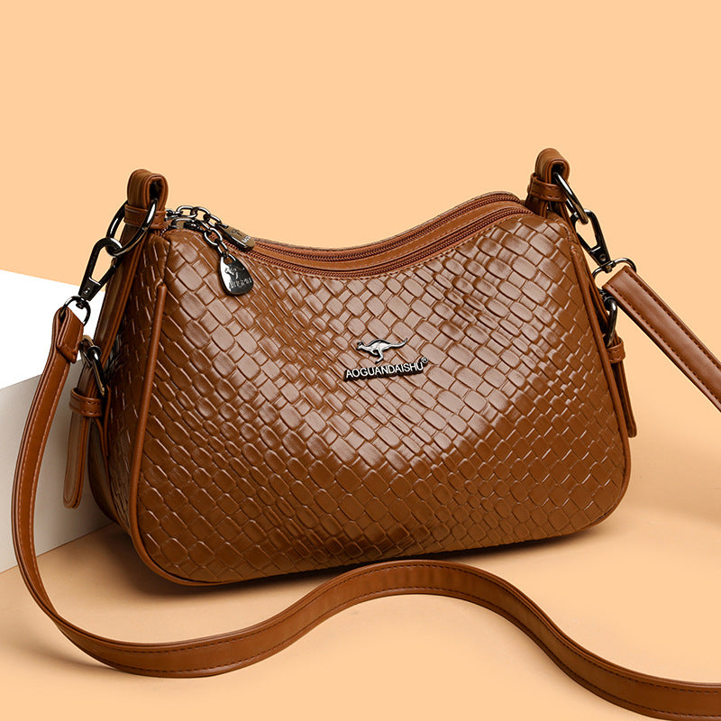 Bolso bandolera tejido de cocodrilo