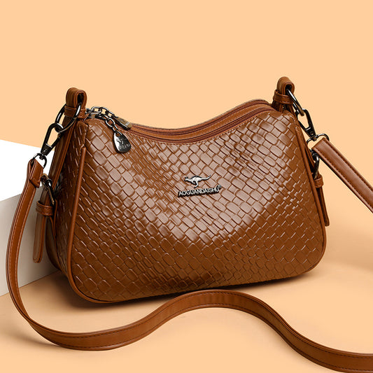 Bolso bandolera tejido de cocodrilo