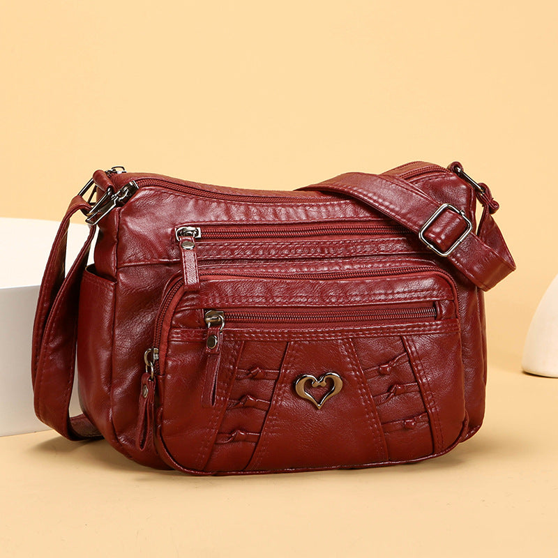 Bolso de piel práctico e informal con múltiples bolsillos