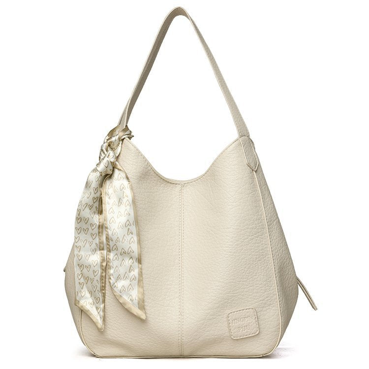 Bolso tote vintage de piel suave con múltiples compartimentos