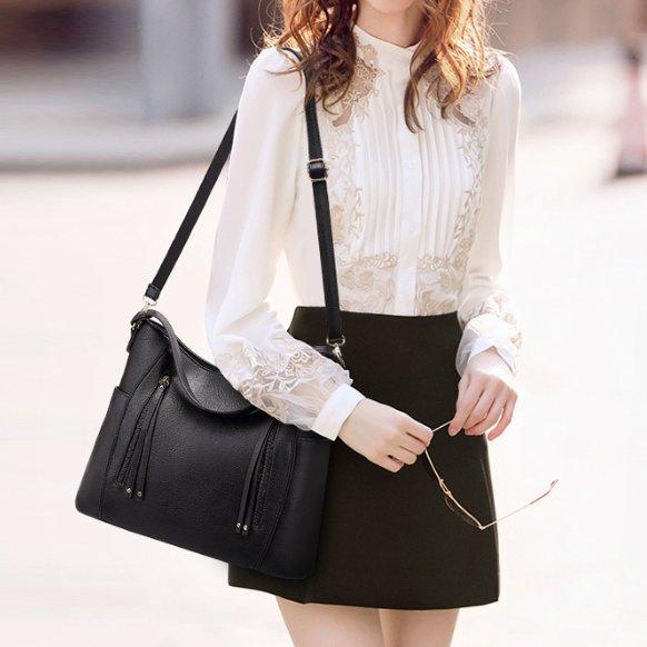 Bolso de mujer con borla y doble cremallera
